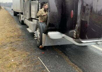 Photograph of Cub Run Repair Man working on big truck