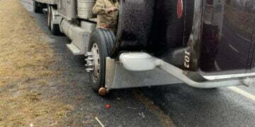 Photograph of Cub Run Repair Man working on big truck