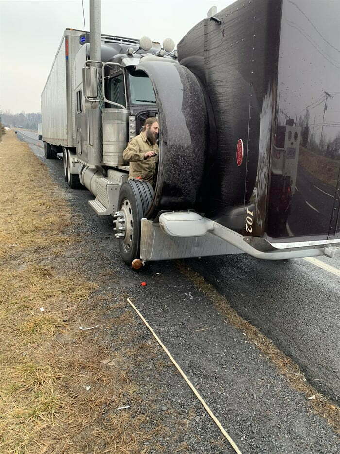 Photograph of Cub Run Repair Man working on big truck