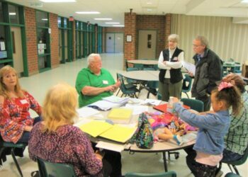 Photograph of people seated at a table on Brocks Gap Heritage Day