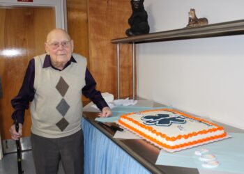 Bill and his cake at the Broadway Emergency Squad