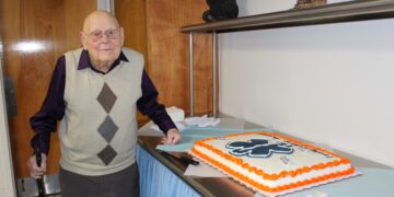 Bill and his cake at the Broadway Emergency Squad