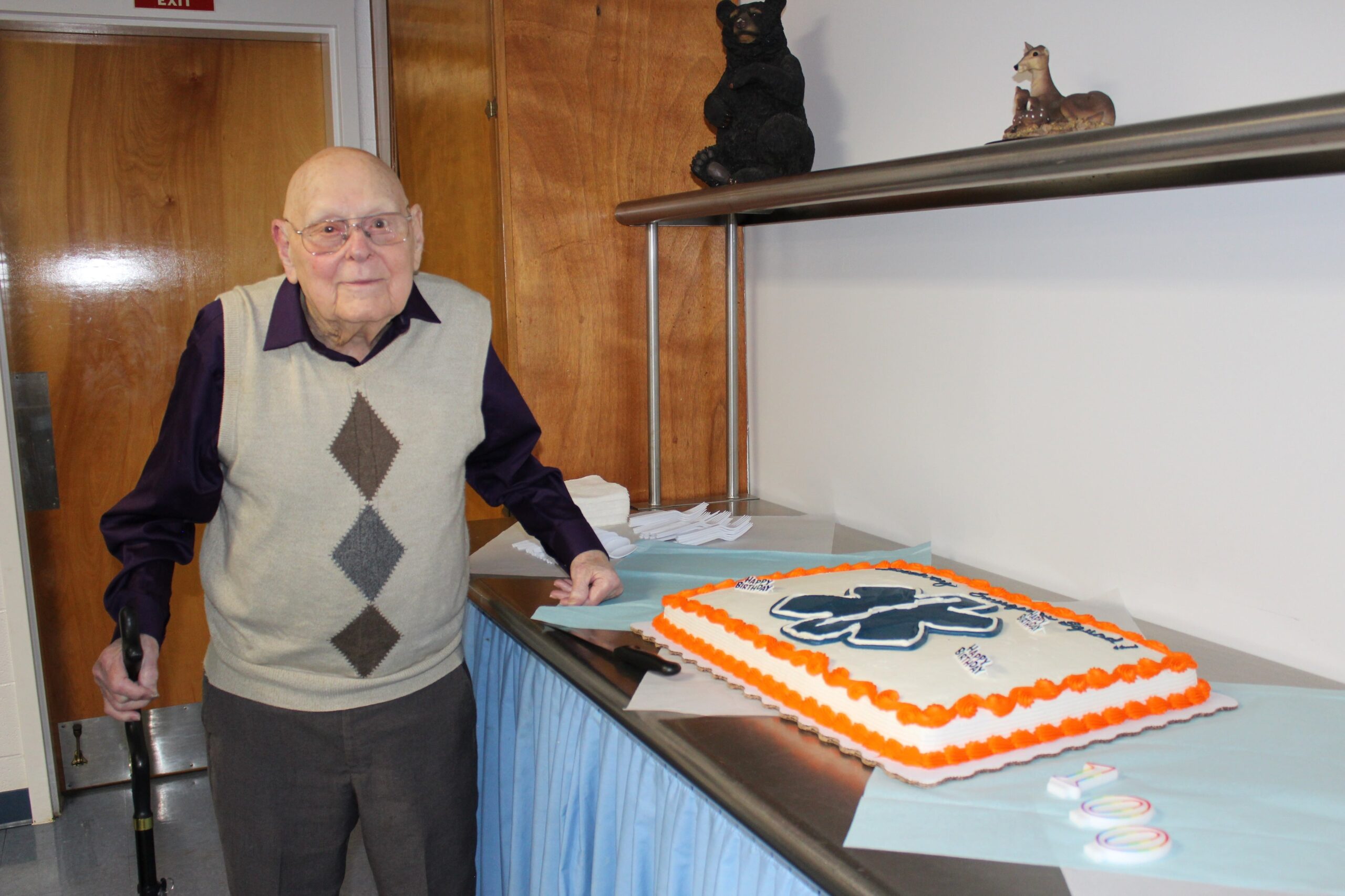 Bill and his cake at the Broadway Emergency Squad