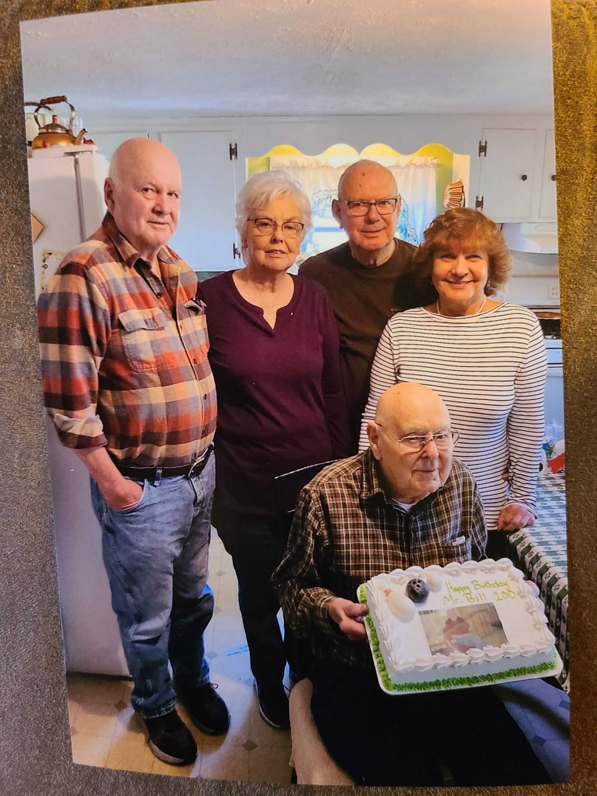 Carroll, Linda, Garry, Darlene, with Bill and his cake