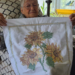 Pearl Keister holding her Blue Ribbon quilt