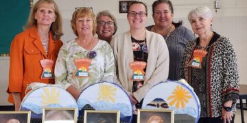 Six women in a group.