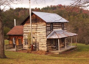 Old house near woods.