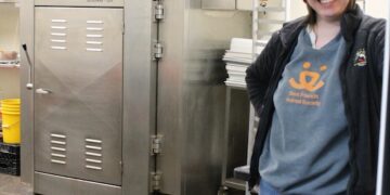 woman in a meat shop.