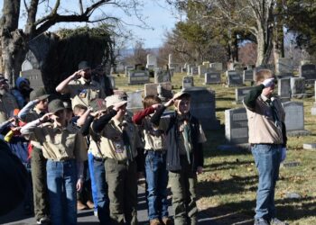 Boy Scouts at graveyard.