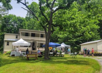Vendors in front of an old church.