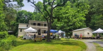 Vendors in front of an old church.