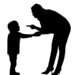 Silhouette of a child and man.